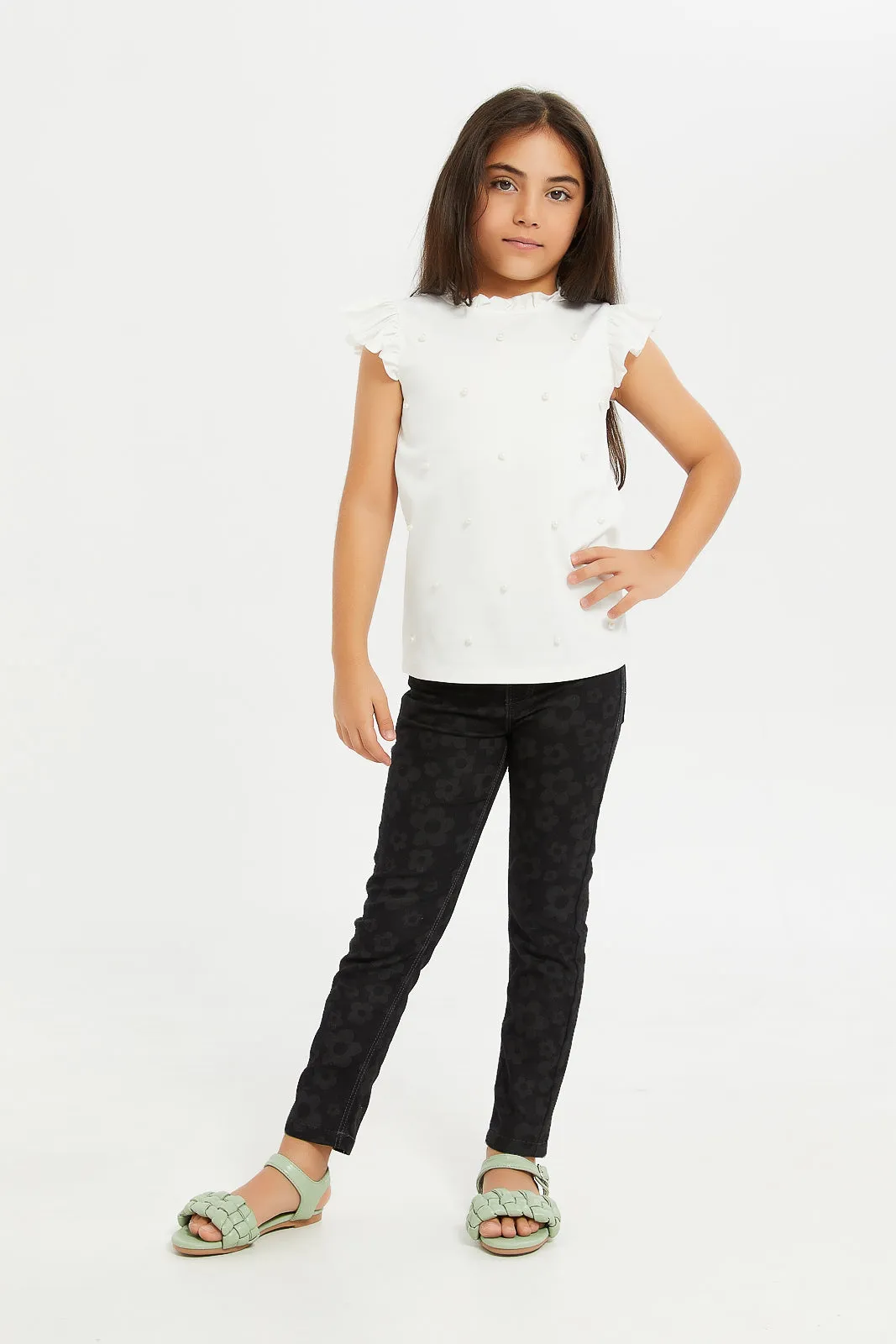 Girls Black Allover Flower Print Jeans