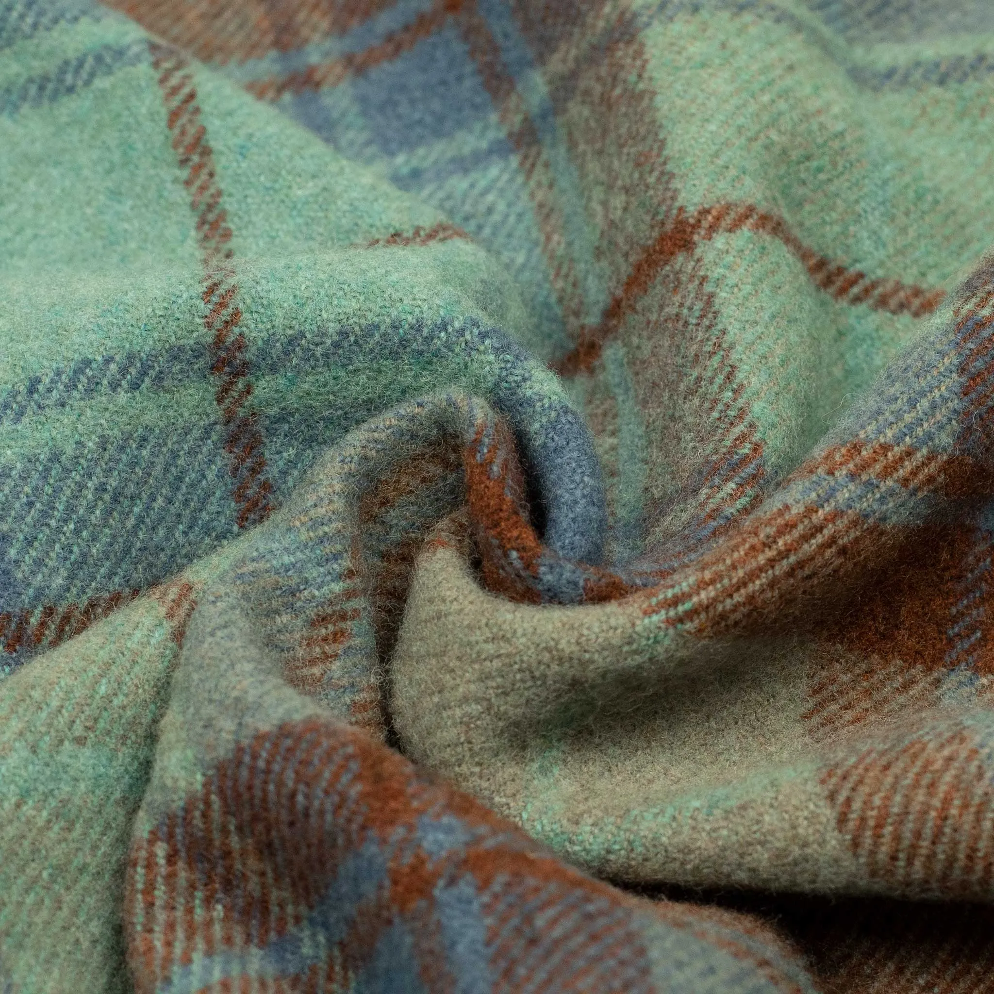 Pastel Plaid throw blanket in seafoam green and dark copper lambswool