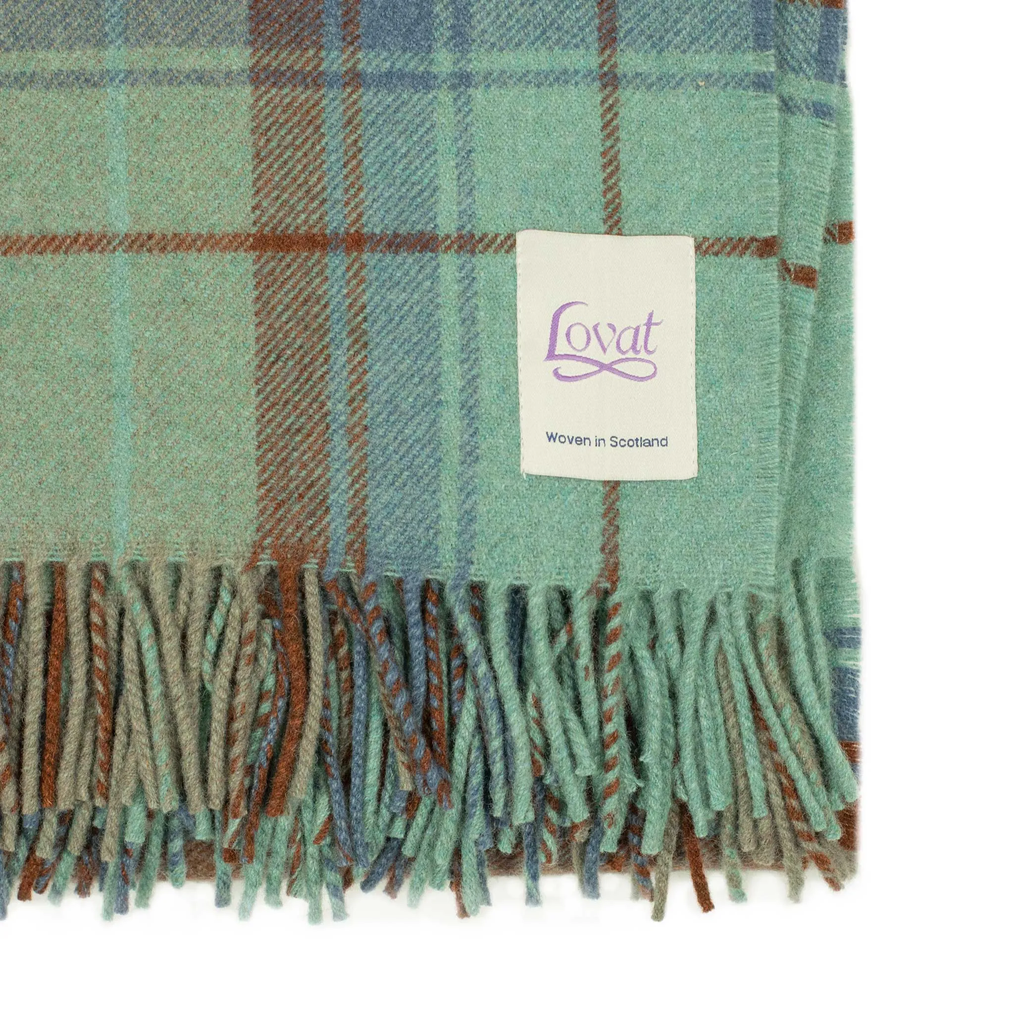 Pastel Plaid throw blanket in seafoam green and dark copper lambswool