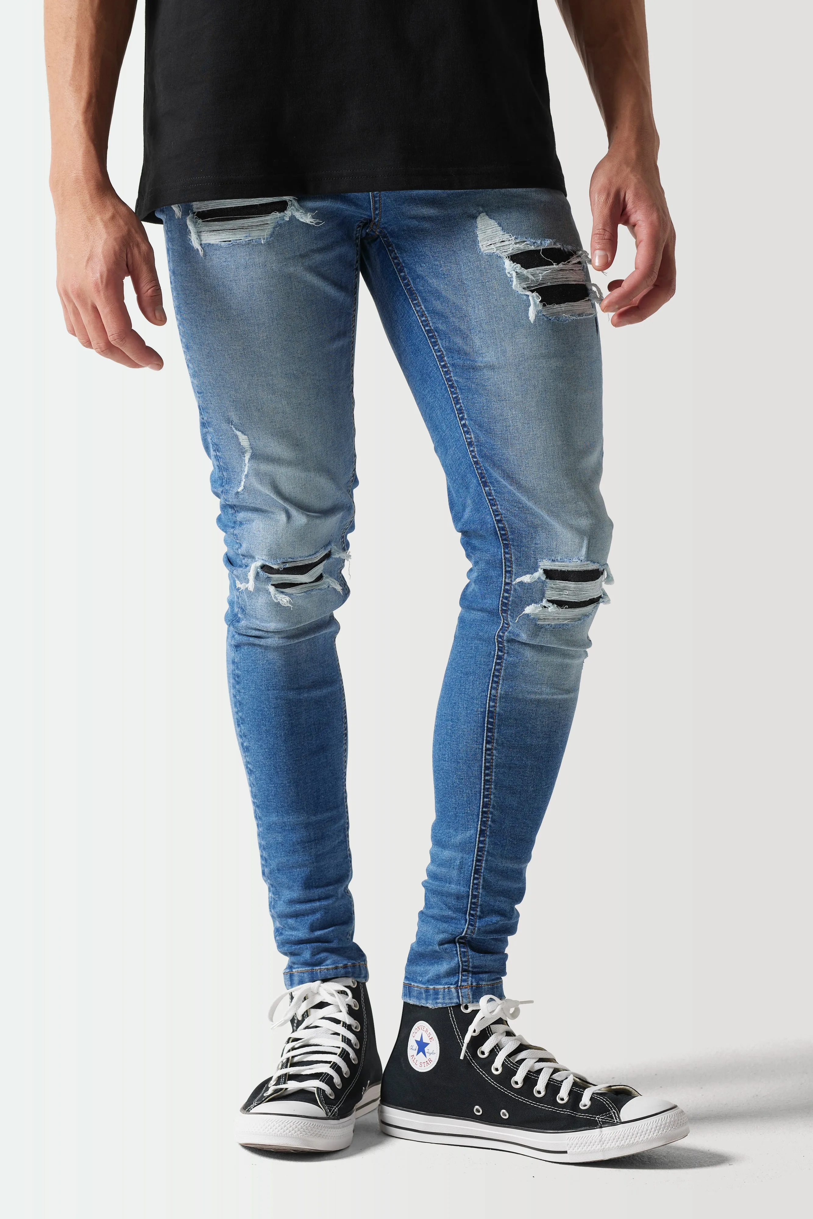 Skinny Sustainable Distressed Jeans - Mid Wash